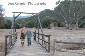 Mom son bridge walk hand in hand